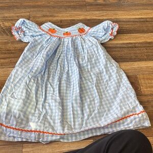 Blue and White Gingham Dress with Orange Accents